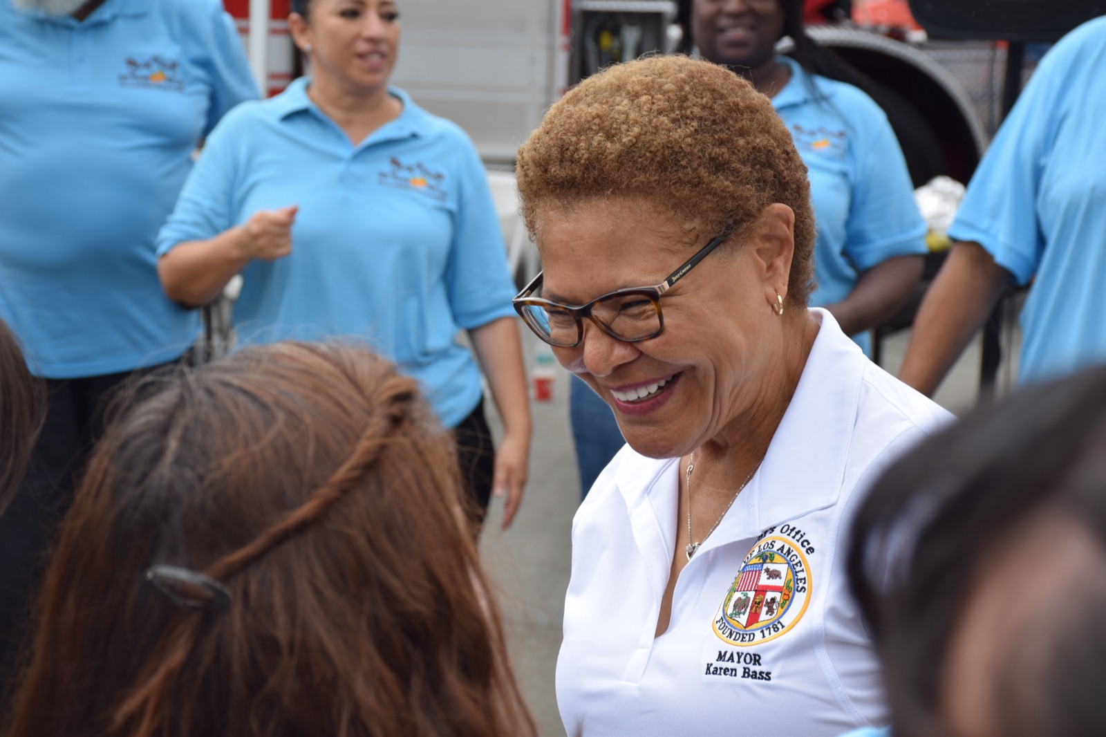 Mayor Karen Bass with firefighters at Breakfast with the Brave